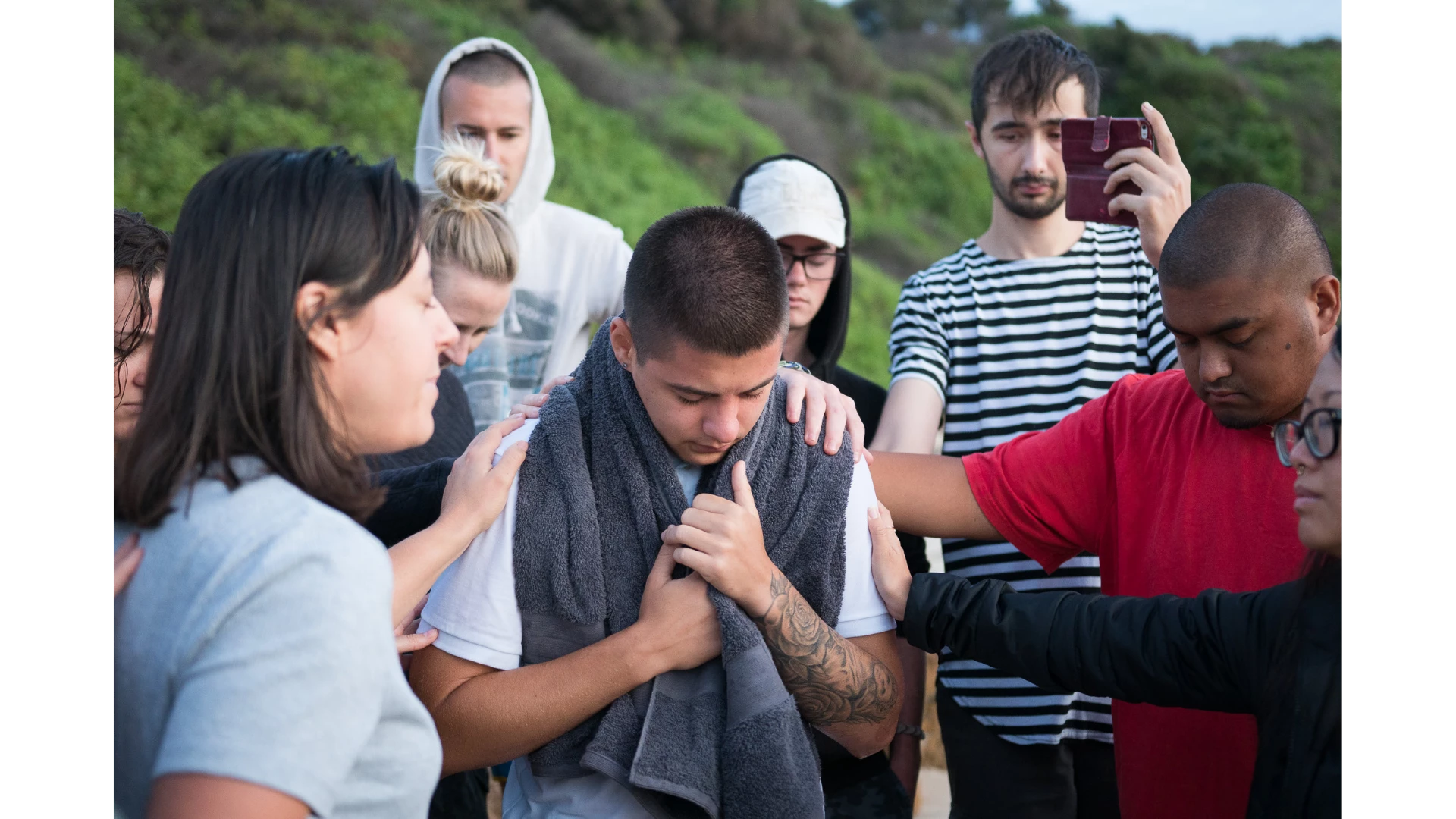 DTS students gathered in baptism prayer at YWAM Wollongong